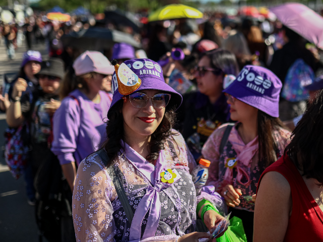 SANTIAGO, CHILE - OCTOBER 14: Thousands of fans line up while waiting for the start of a c