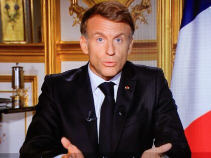 This photograph shows a television monitor broadcasting France's President Emmanuel Macron