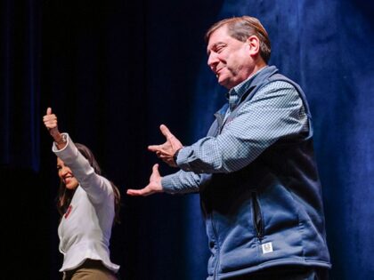 Representative Alexandria Ocasio-Cortez, a Democrat from New York, left, and Troy Jackson,