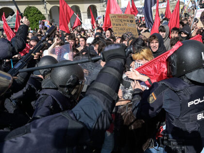 A CORUÑA, GALICIA, SPAIN - OCTOBER 21: Police charges during a rally against the visit of