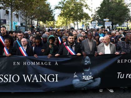 Attendees and officials including mayor of Aubervilliers Sofienne Karroumi (C) and Saint-D