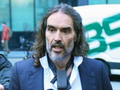 Russell Brand arriving at Southwark Crown Court, London, where he faces three charges of r