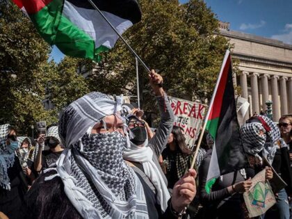 Pro-Palestinian demonstrators march through the Columbia University campus to mark one yea