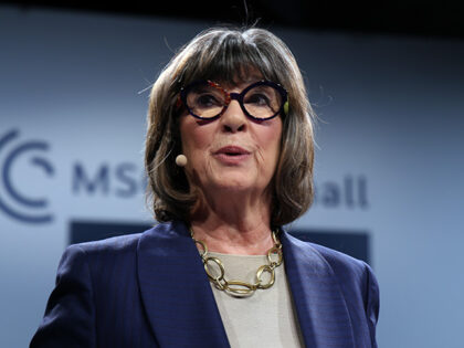 Christiane Amanpour speaks to the audience to introduce Reza Pahlavi, son of Mohammad Reza