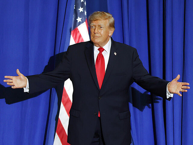 U.S. President Donald Trump gestures as he arrives to speak at a campaign rally with Oklah