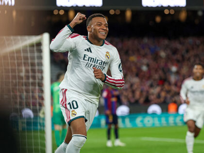 Real Madrid's French forward #10 Kylian Mbappe celebrates scoring his team's fir
