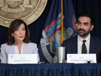 New York Gov. Kathy Hochul (L) listens as New York City Mayor Zohran Mamdani speaks during