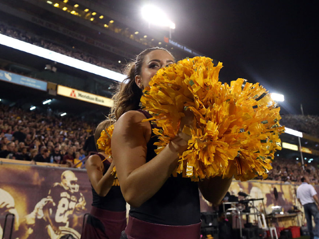 WATCH: Arizona State Cheerleader Shoved to the Ground, Hit by Cops After Interfering Arrest