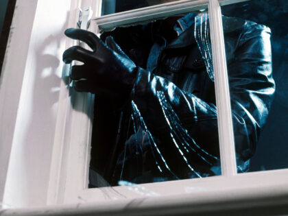 Intruder breaks window