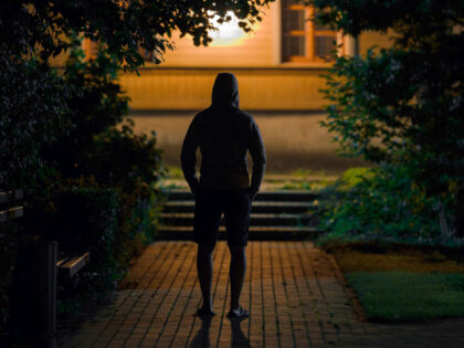 Intruder outside at night