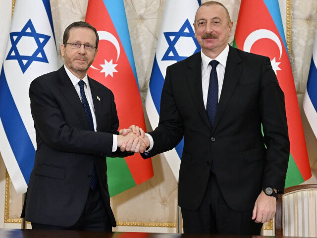Israeli President Isaac Herzog (L) meets with Azerbaijani President Ilham Aliyev (R) in Ba