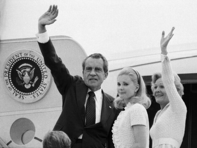 Original Caption) Richard Nixon, his wife Pat and daughter Tricia boarding plane after his