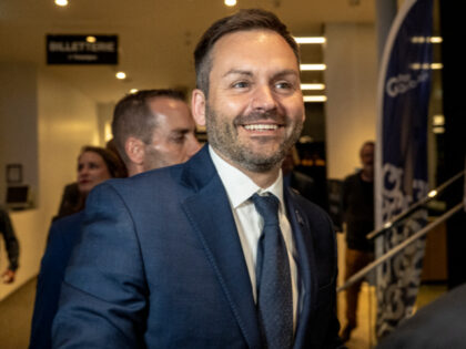 Leader of the Parti Quebecois (PQ) Paul St-Pierre Plamondon walks to make a speech after w