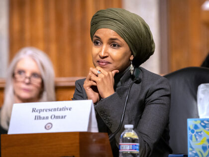 FILE - Rep. Ilhan Omar, D-Minn., listens during a Congressional spotlight hearing on Capit
