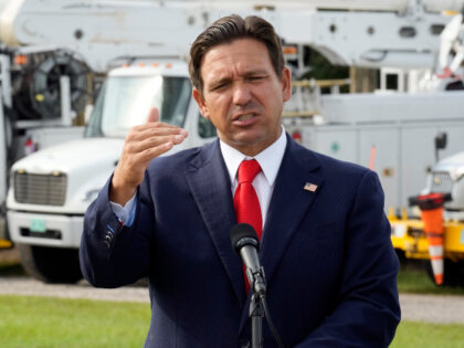 Florida Gov. Ron DeSantis gestures during a news conference, Wednesday, Sept. 25, 2024, at