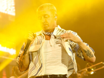 PARIS, FRANCE - JULY 19: Macklemore performs onstage during the 5th Lollapalooza Paris Fes