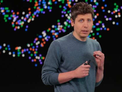 Sam Altman speaks on stage