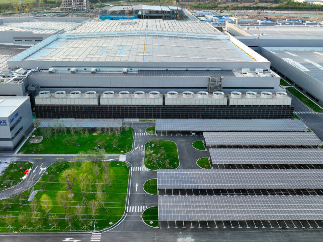 Aerial view of solar panels installed on the roof of buildings at the photovoltaic wafer p