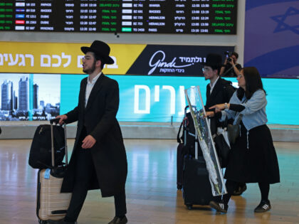 Passengers are pictured at the arrivals of the Ben Gurion Airport near Tel Aviv on Septemb