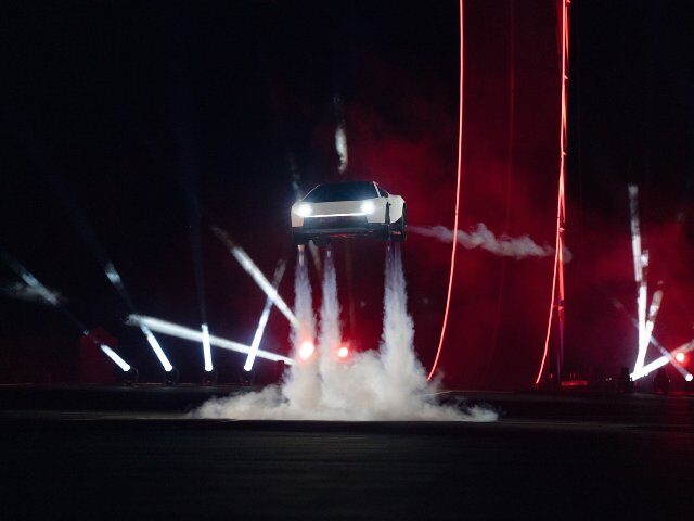 Musk Unveils Flying Tesla Roadster at SpaceX Texas Site