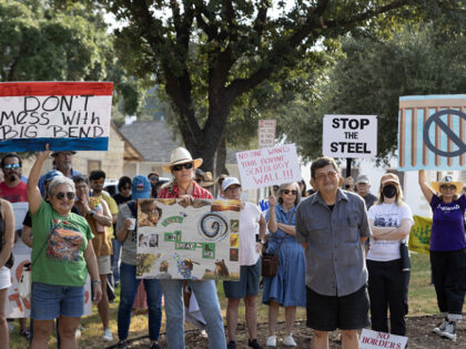 SAN ANTONIO, TEXAS - AUGUST 28: A crowd gathers at a rally for Big Bend National Park, Fri