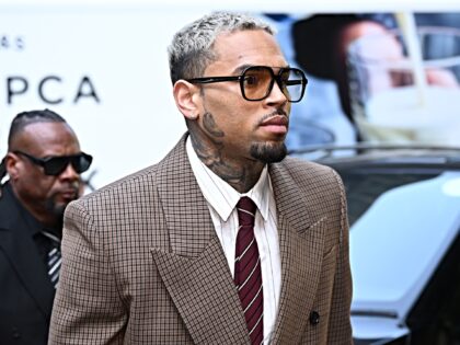 LONDON, ENGLAND - JULY 11: R&B singer Chris Brown arrives at Southwark Crown Court on July