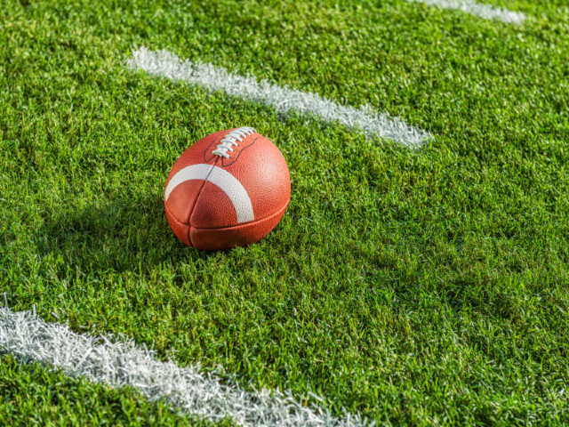 WATCH: High School Ref Suspended After Grabbing Player During TD Celebration