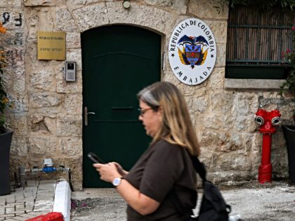 A woman walks past the headquarters for the Colombian embassy to Israel in Jerusalem on Oc
