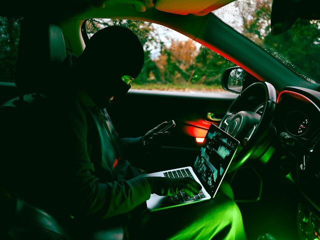 Anonymous crook in car