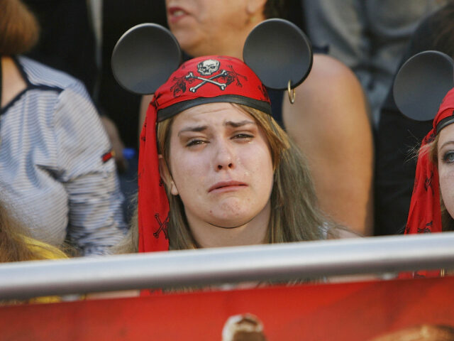 ANAHEIM, CA - MAY 19: A fan cries while attending the premiere of Walt Disney's &quo