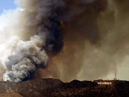 Hollywood, UNITED STATES: Smoke rises from a brush fire near the Hollywood sign in Hollywo