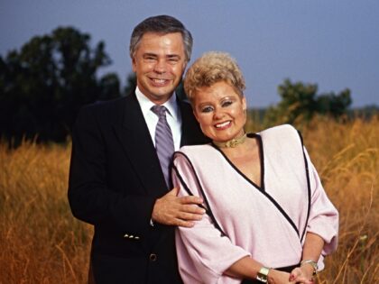 Fort Mill, SC- Jim and Tammy Faye Bakker on a hill overlooking Heritage USA, their megachu