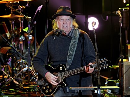 LOS ANGELES, CALIFORNIA - APRIL 26: Neil Young performs onstage at Light Up the Blues 7 Co