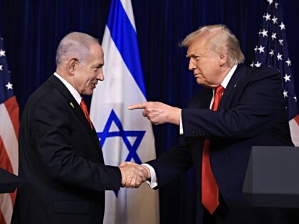 PALM BEACH, FLORIDA - DECEMBER 29: U.S. President Donald Trump shakes hands with Israeli P