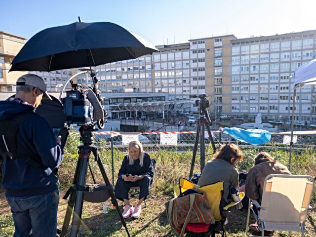 ROME, ITALY - OCTOBER 13: Members of the media sit outside the Gemelli Hospital as Pope Le