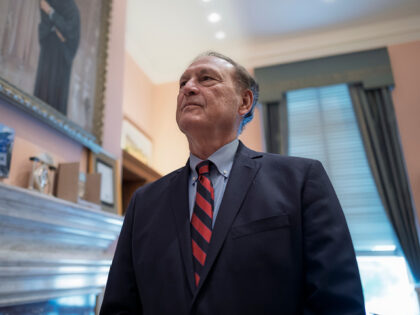 Associate Justice Samuel Alito stands in his chambers at the Supreme Court during an Assoc
