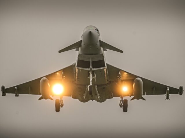 CONINGSBY, ENGLAND - FEBRUARY 19: A Royal Air Force Eurofighter Typhoon jet comes in to la