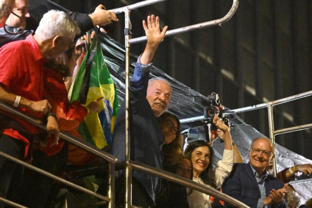 Brazil's President and presidential candidate Luiz Inacio Lula da Silva gestures to c