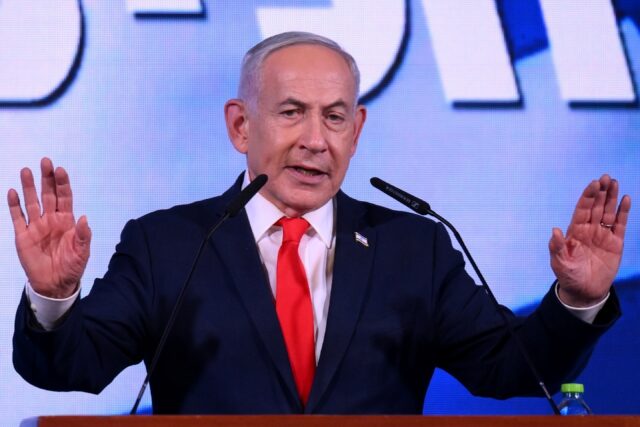 Israel's Prime Minister Benjamin Netanyahu addresses his supporters at the election n
