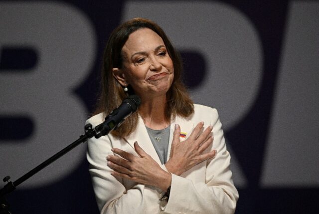 Opposition leader Maria Corina Machado has returned to Venezuela after nearly a year in ex