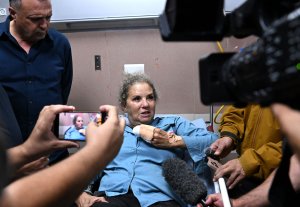 Israeli settlers attack Palestinian olive harvesters, photojournalist