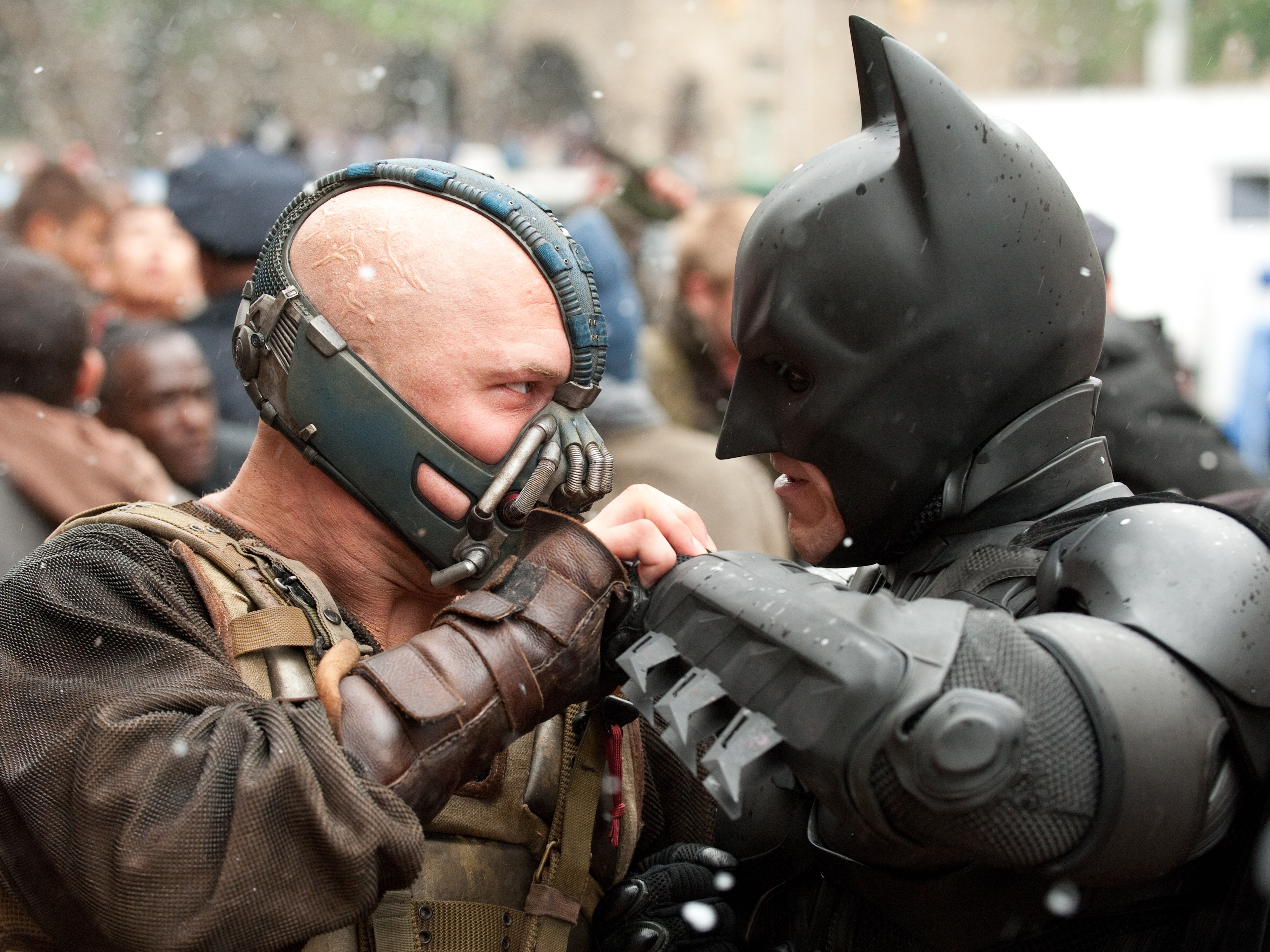 'The Dark Knight Rises' Review: Batman Battles Bane, Nolan Nukes Occupy Wall Street