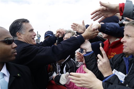 Obama, Romney campaign with eye on storm forecast