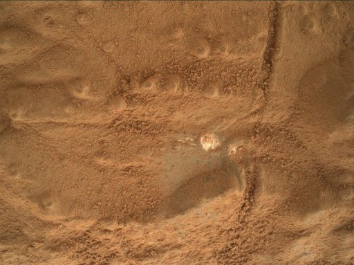 In Milestone, Mars Rover Collects First Bedrock Sample