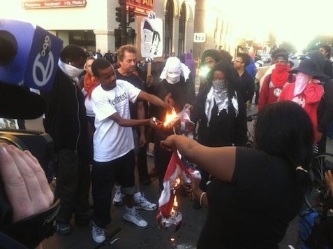 Oakland Anti-Zimmerman Protesters Burn American Flag
