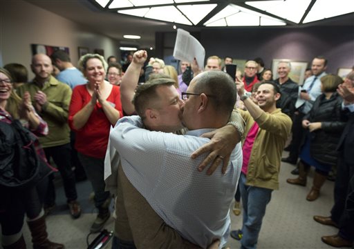 Gay couples wed in Utah after judge overturns ban