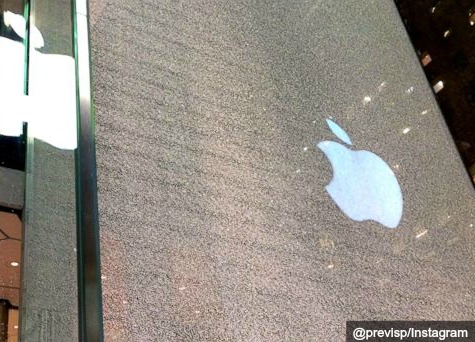 Window of Apple's Iconic Glass Cube Store Broken by Snowblower