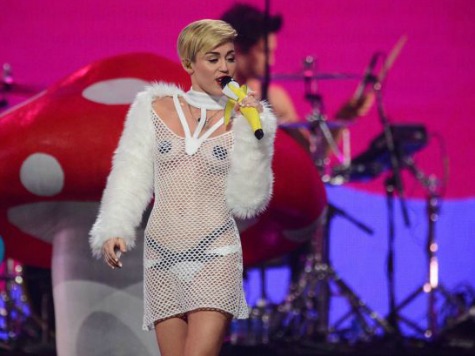 Miley Cyrus Weeps, Bares More During 'Wrecking Ball' Performance
