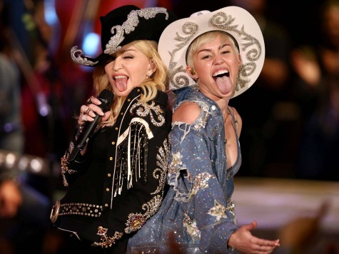 Former Trend Setter Madonna Apes Miley Cyrus's Tongue Gymnastics