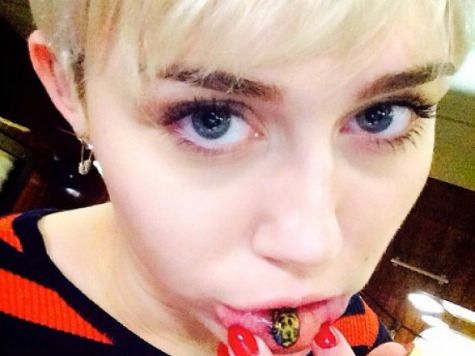 Miley Cyrus Gets Cat Tattoo on Her Inner Lip